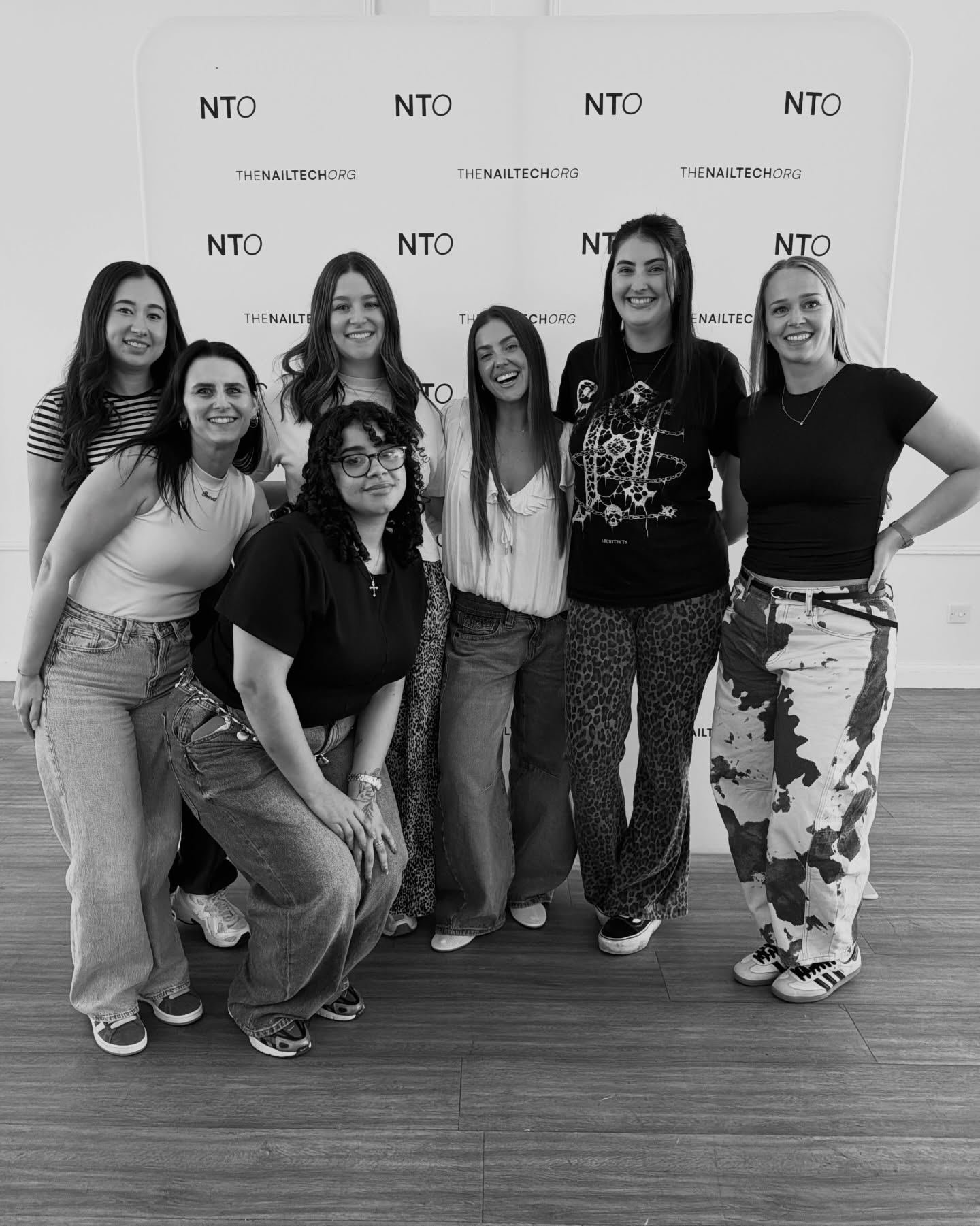 A group of The Nail Tech Org members connecting in person at a community event
